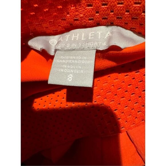 Athleta Trekkie Crest 2 in 1 shortie size 8 orange racing red - Picture 4 of 6